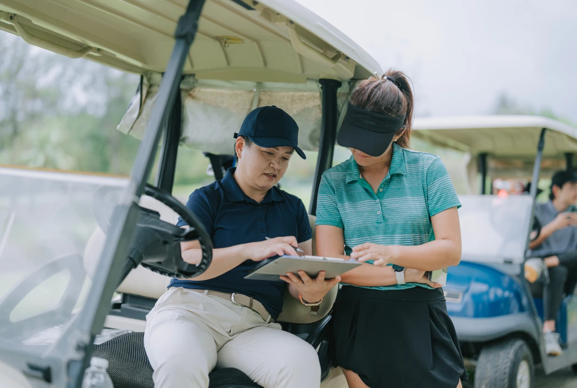Golfers reviewing game plan